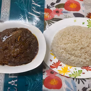 Kitaylay Togbogee w/ Rice